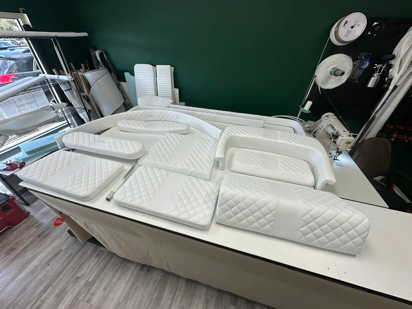 Fresh white diamond-stitched boat cushions handmade by GVO Classic Upholstery in North Port, FL